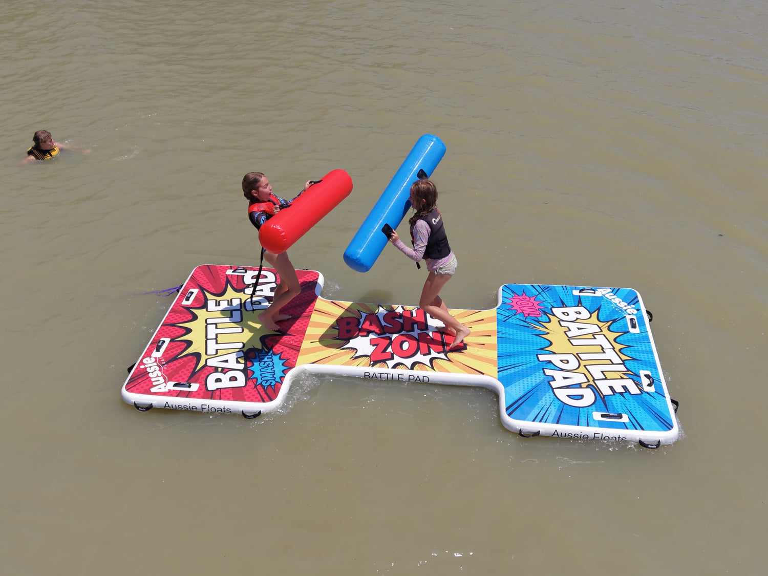 Aerial view of families using the Aussie Floats Battle Pad