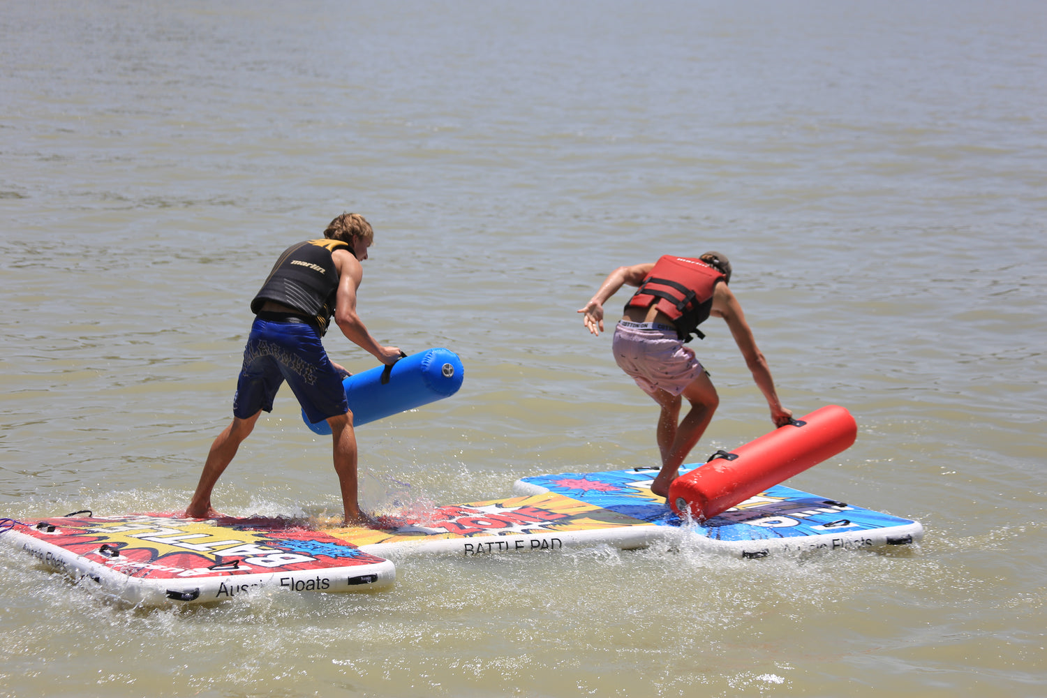 Kids playing the Aussie Floats Battle Pad water game